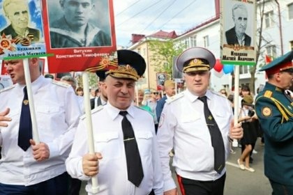 Российский прокурор и генерал МВД несли одно и то же фото на «Бессмертном полку»